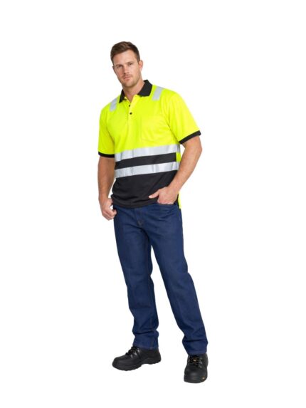 Vulcan hi-viz golf shirt in yellow and navy worn by model